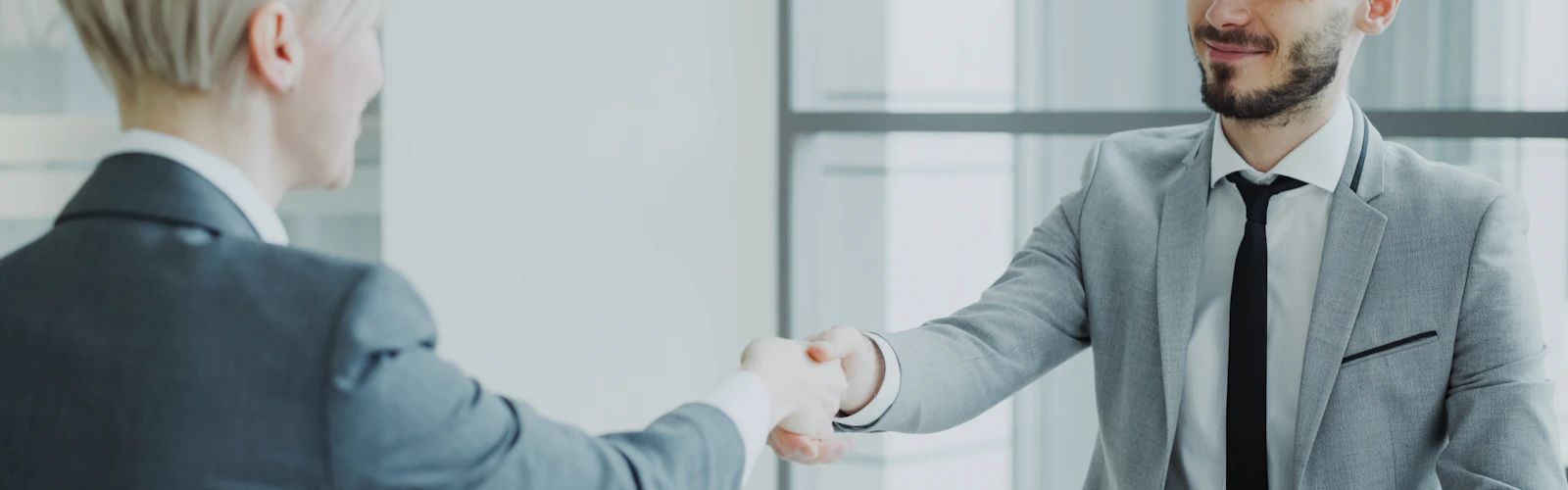 Business owner evaluating debt collection agency options